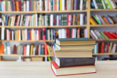 image of a stack of books on a table