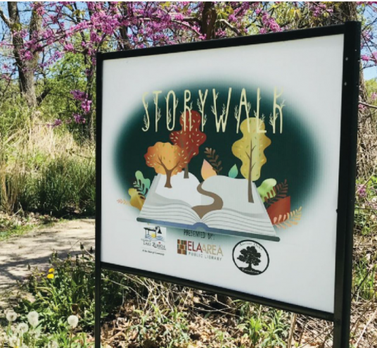 StoryWalk Sign in park. 