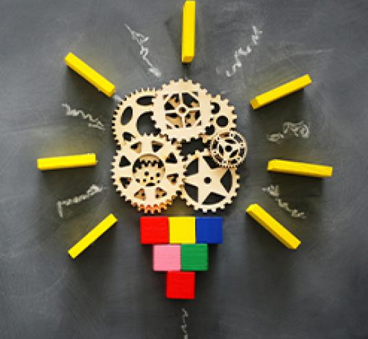 Lightbulb made of gears and blocks. 