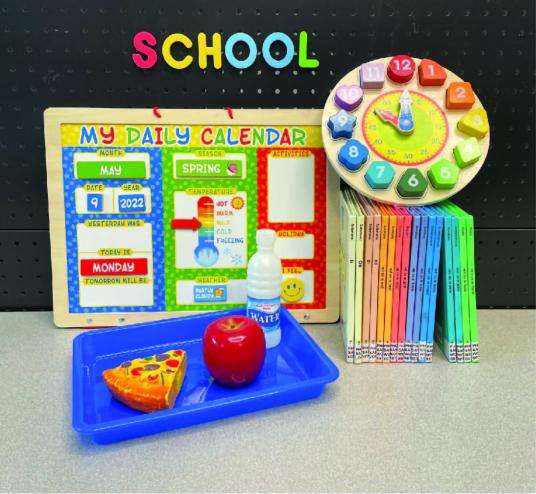 play good, books. clock and school written in magnetic letters