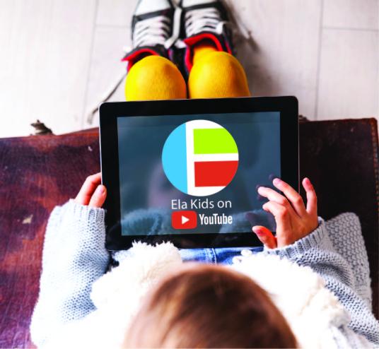Child using tablet with Ela Kids Logo