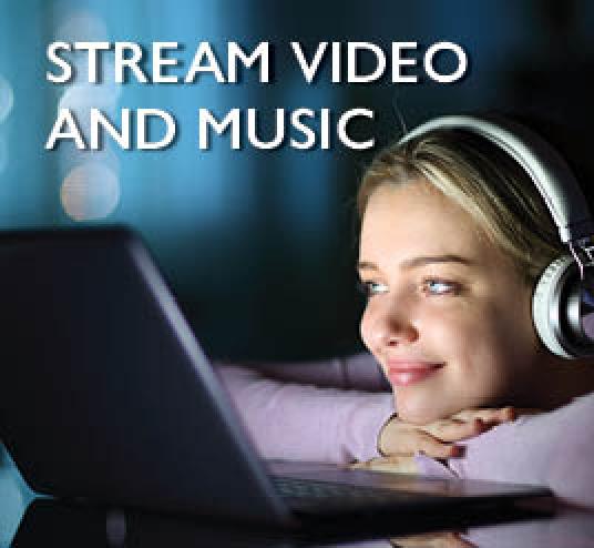 Image of a person looking at a screen