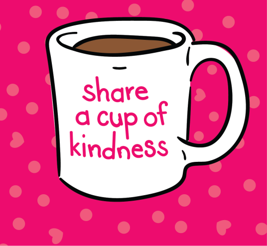 A mug of cocoa with the words "share a cup of kindness" on it